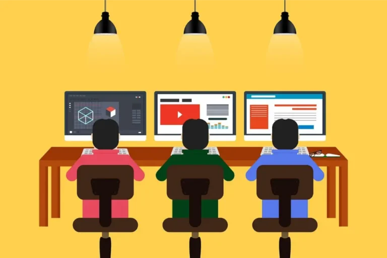 3 app developers doing system design work on their computers.